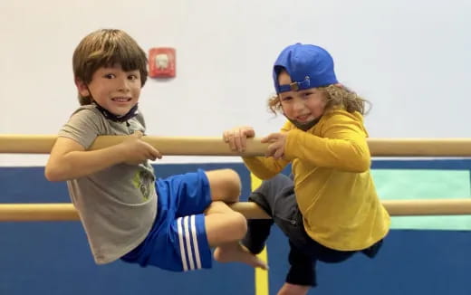 a couple of kids playing baseball