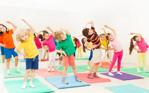 a group of children exercising