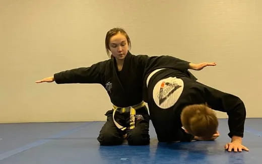 a man in black karate uniform