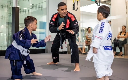 a group of people in karate uniforms