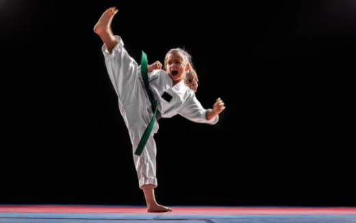 a person in a karate uniform