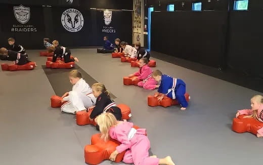 a group of people sitting on the floor