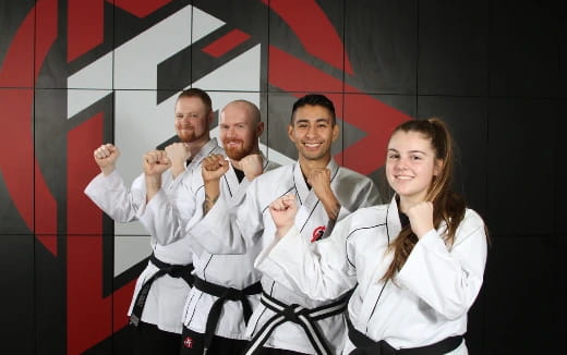 a group of people posing for a photo