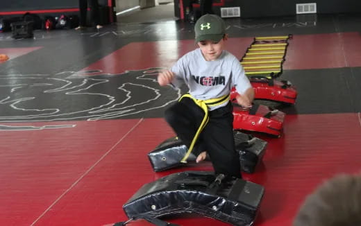 a boy riding a go kart