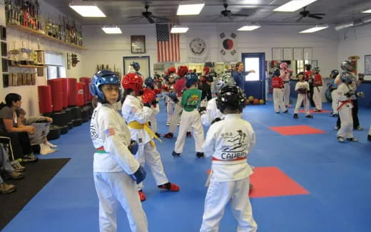 a group of kids in a karate class