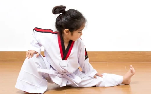 a person in a karate uniform