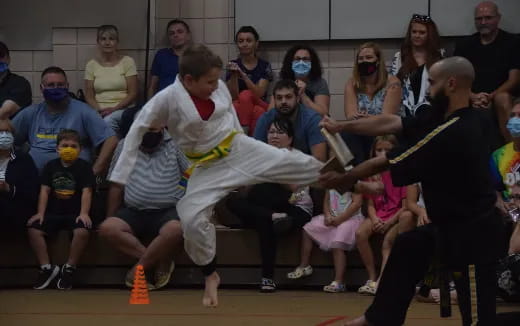 a group of people in a gym