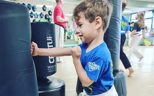 a young boy in a gym