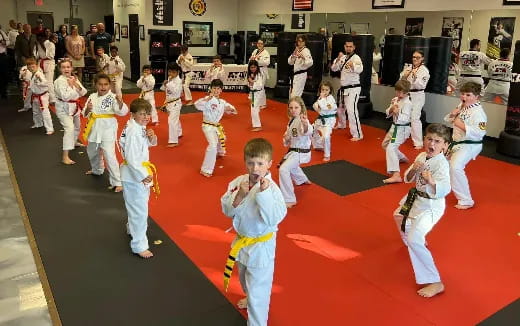 children in white karate uniforms
