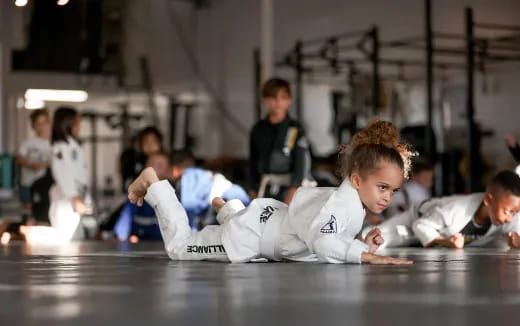 a group of people in karate uniforms