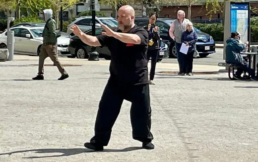 a man in black uniform