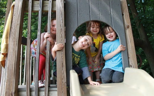 a group of children on a slide