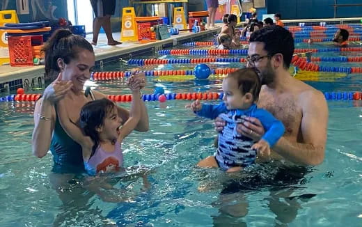 a group of people in a pool