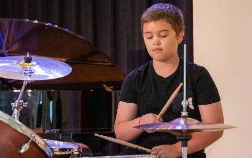 a person playing drums