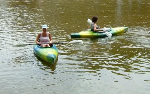 a couple of people in kayaks