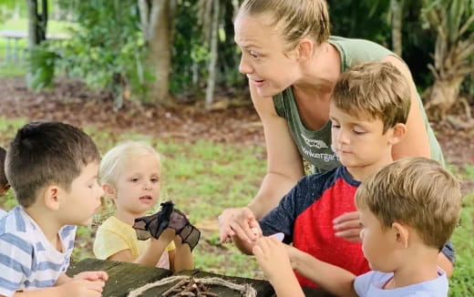 a person and a group of children