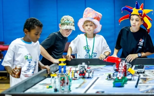 a group of kids playing with toys