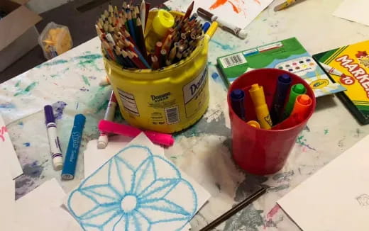 a paintbrush and paint brush on a table