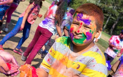 a child with paint on his face