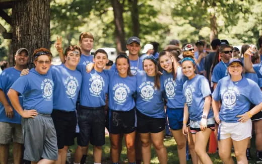 a group of people wearing matching t-shirts