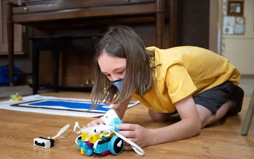 a person playing with toys