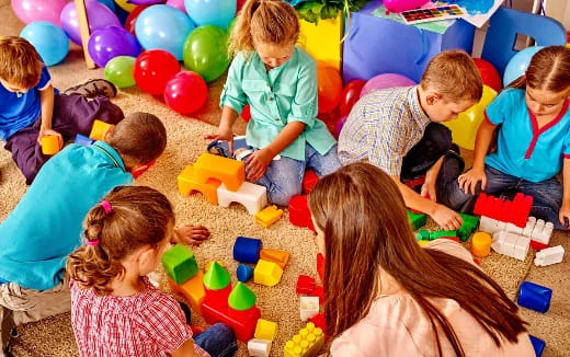 a group of children playing with toys