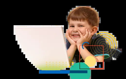 a boy holding a laptop