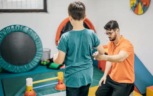 a group of men playing ping pong