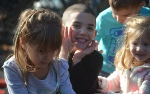 a group of children smiling