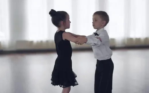 a person and a boy dancing
