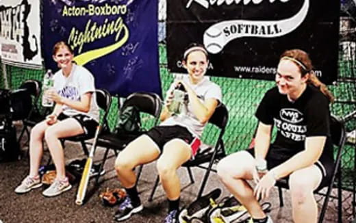 a group of women sitting in chairs