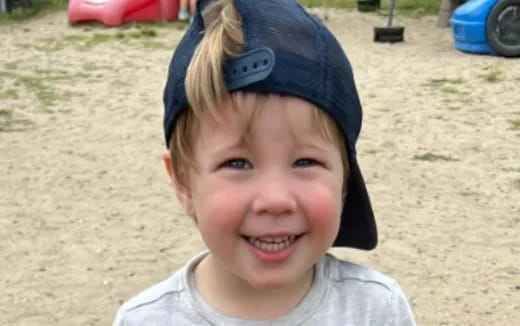 a child wearing a hat