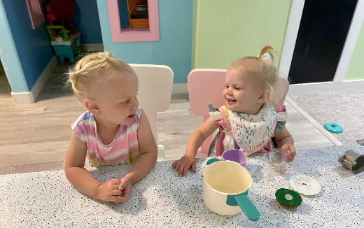 two children playing with toys