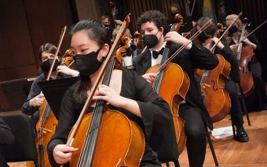 a group of people playing instruments