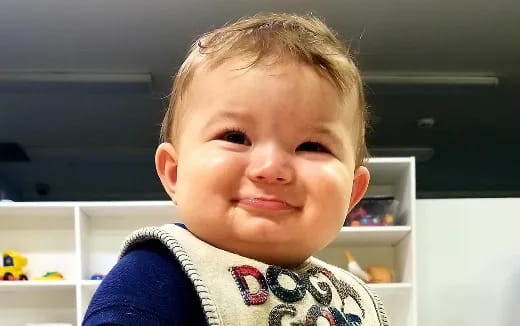 a child smiling for the camera
