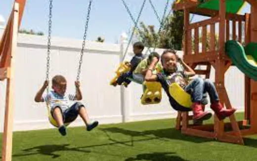 kids on a swing set