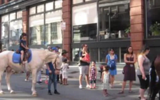 a group of people walking on the street