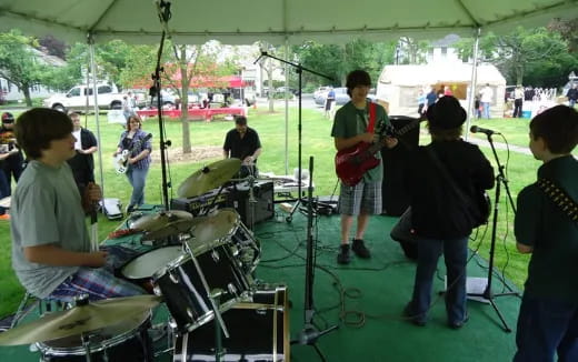 a group of people playing instruments