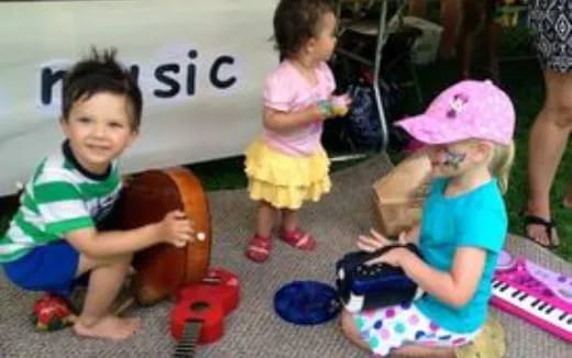 a group of children playing with toys