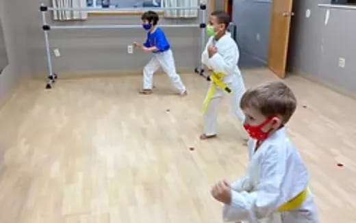 a group of children playing with toys