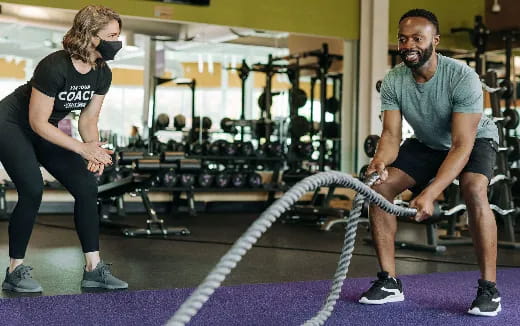 a man and a woman working out