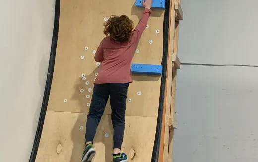 a person climbing a wall