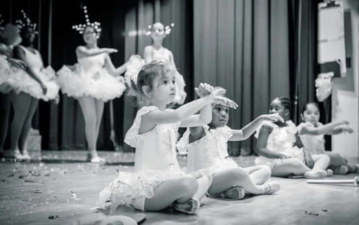 a group of children dancing