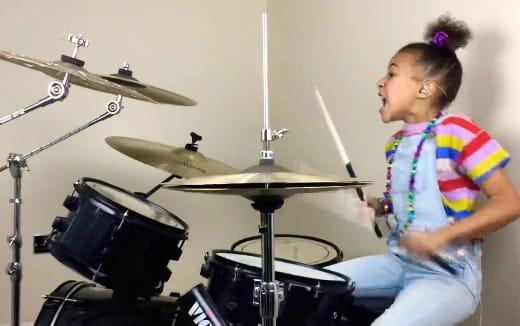 a man playing drums