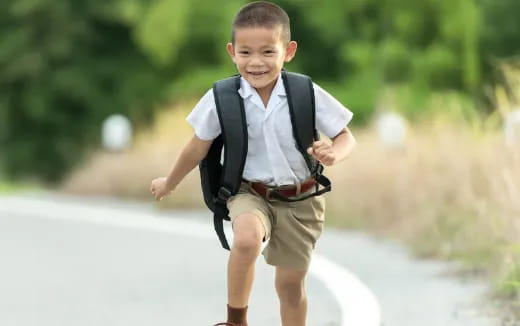 a boy wearing a backpack