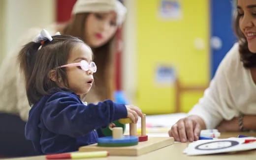 a young girl wearing goggles