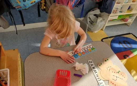 a child playing with a toy