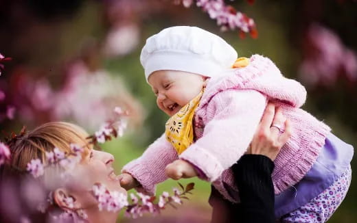 a baby in a flowery field