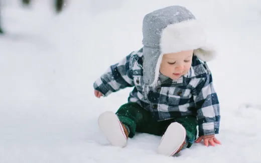 a baby in a snow suit