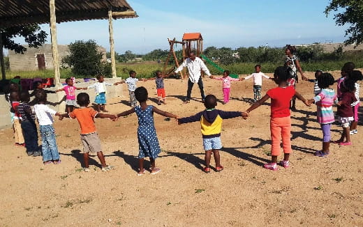 a group of children playing outside